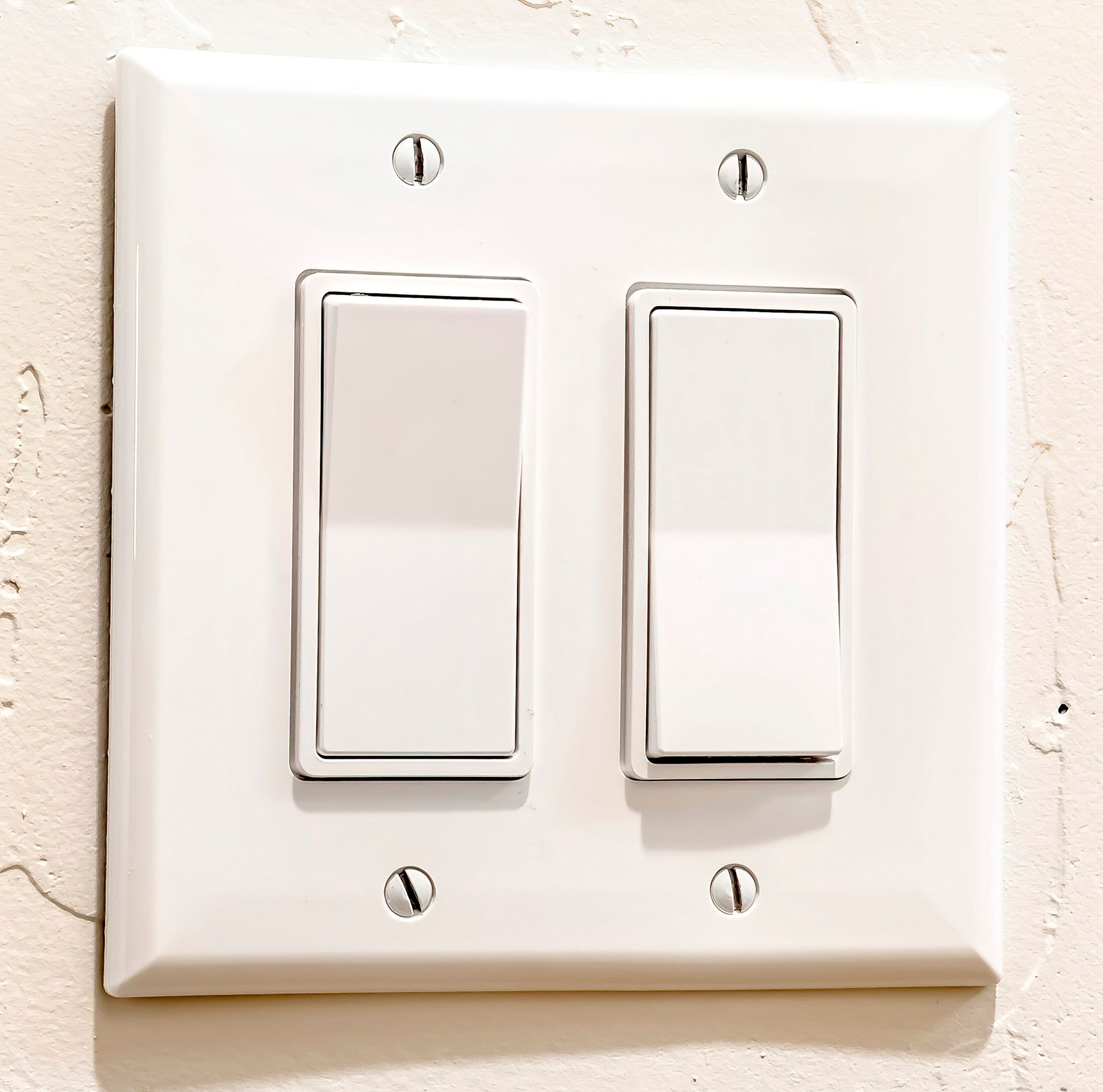 A two-switch rocker-type wall plate