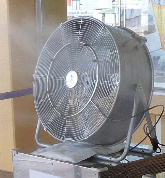 Pictured is a large, floor-model electric-powered cooling/misting fan.